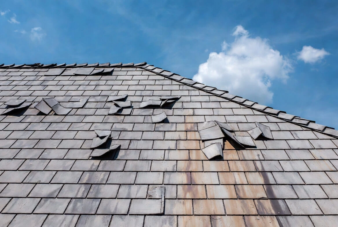 Asbestos roof shingles on an older building structure
